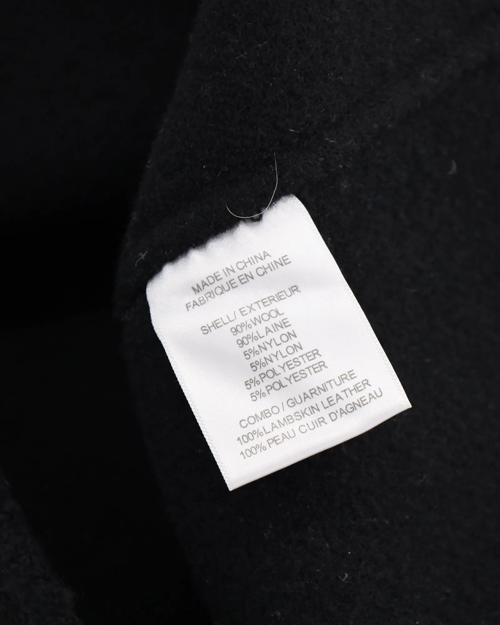 Theory Leather-Trimmed Mini Skirt in Black Wool